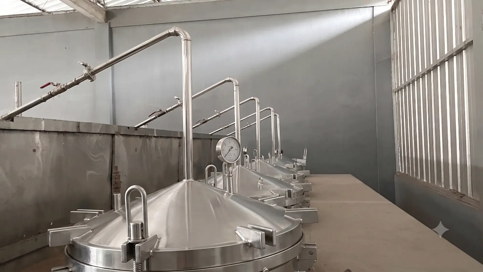 The row of distillation vessels running at the Teeraz factory